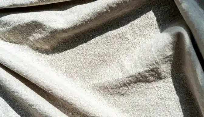 details of natural cream color coarse linen fabric