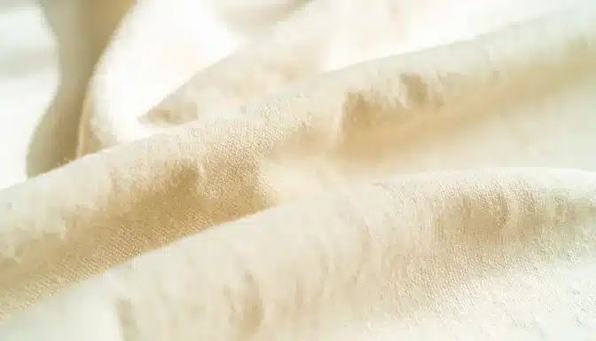 gentle linen fabric folds in soft light