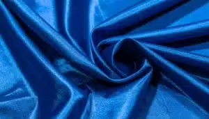 shiny blue satin fabric folds