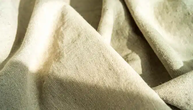 smooth linen cloth folds in warm hue