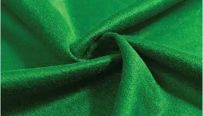 vibrant green velvet fabric texture closeup