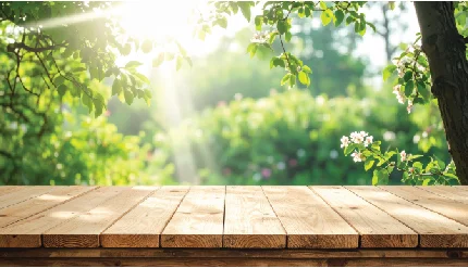 wooden table in a sunlit green garden