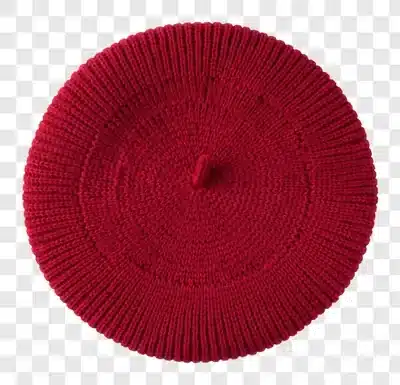 a classic red knitted beret hat viewed from above on a white background