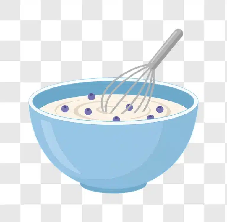 blueberry batter being whisked in a light blue bowl edited