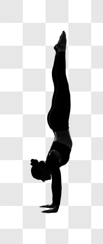 woman performing handstand silhouette against white edited