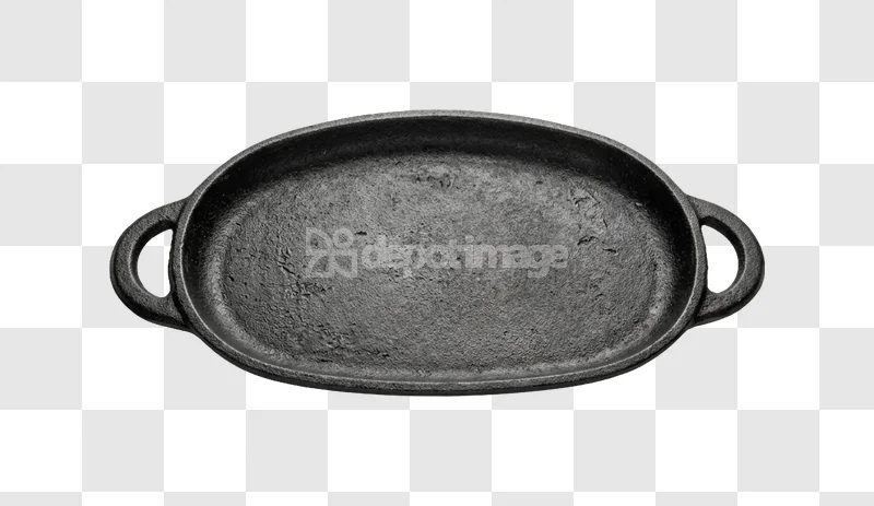 Oval Cast Iron Skillet Overhead View dark gray textured metal