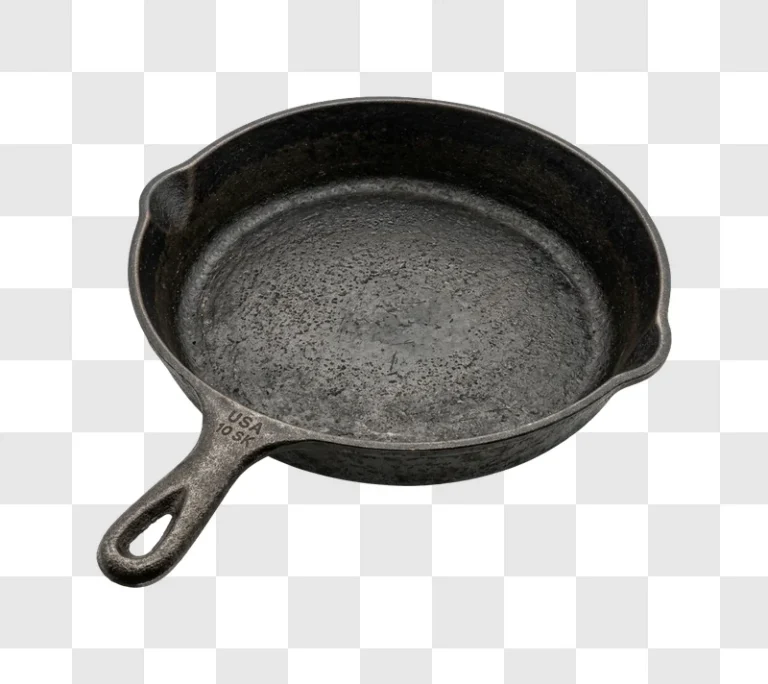 Used Cast Iron Skillet on Black Background, dark textured metal pan